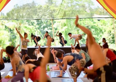 Young ho Kim teaching a community yoga class in Bali