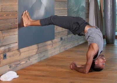 Mathioeu Boldron doing a back bend against wall